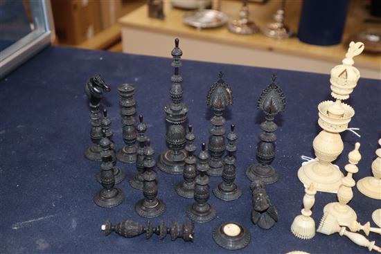A 19th century Indian stained and natural ivory part chess set